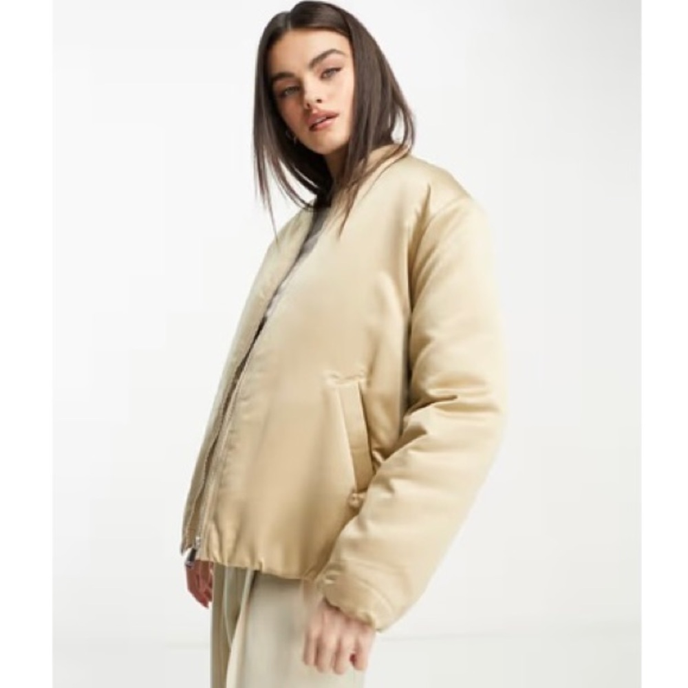 Padded bomber jacket in beige golden color